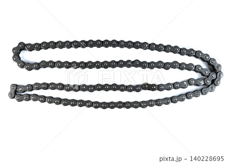 Motorcycle engine steel roller timing drive chain replacement hardware loop top view. Motorcycle engine steel roller timing drive chain replacement hardware loop top view. 140228695