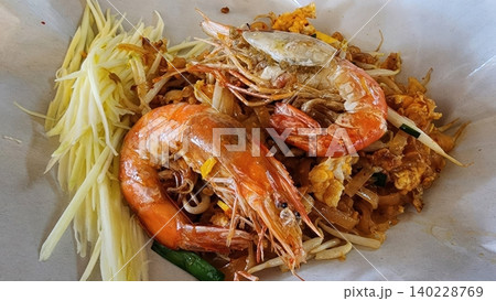 Traditional Pad Thai with Jumbo Prawns and Shredded Green Mango Traditional Pad Thai with Jumbo Prawns and Shredded Green Mango 140228769