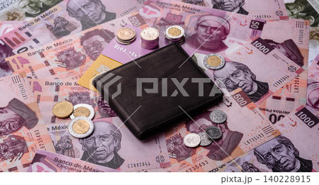 Mexico, Mexican peso, paper money and coins, financing and commodity exchange. Mexican currency Mexico, Mexican peso, paper money and coins, financing and commodity exchange. Mexican currency 140228915