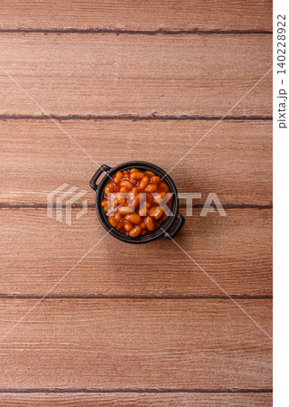Beans in tomato sauce, a canned stew for the dinner table. Beans in tomato sauce Beans in tomato sauce, a canned stew for the dinner table. Beans in tomato sauce 140228922