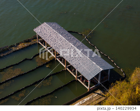 Aerial View of Traditional Pavilion Overlooking Erhai Lake in Dali, Yunnan Aerial View of Traditional Pavilion Overlooking Erhai Lake in Dali, Yunnan 140229934