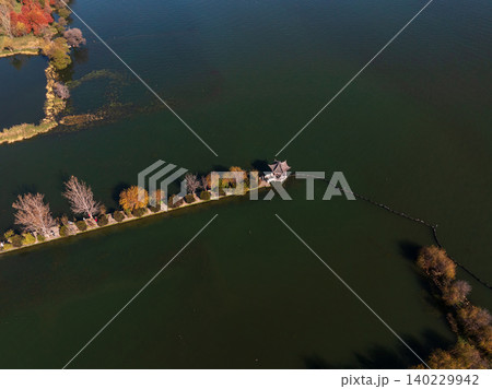 Aerial View of Erhai Lake in Dali, China with Autumn Foliage and Calm Waters Aerial View of Erhai Lake in Dali, China with Autumn Foliage and Calm Waters 140229942