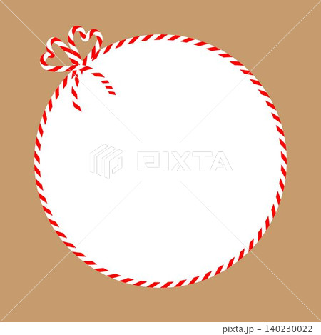 Square craft brown background with candy cane ribbon. Christmas packing string for decoration and present Square craft brown background with candy cane ribbon. Christmas packing string for decoration and present 140230022