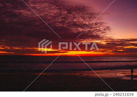 Time lapse Paradise Beach Under Fiery Sky 140231839