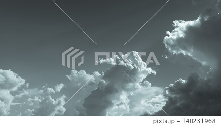 Dark dramatic sky and clouds. Background for death and sad concept. Gray sky and fluffy white clouds. Thunder and storm sky. Sad and moody sky. Nature background. Dead abstract background. Cloudscape. Dark dramatic sky and clouds. Background for death and sad concept. Gray sky and fluffy white clouds. Thunder and storm sky. Sad and moody sky. Nature background. Dead abstract background. Cloudscape. 140231968