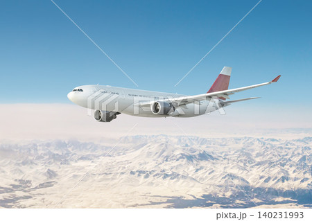 Modern wide body aircraft flying over snow covered mountains 140231993
