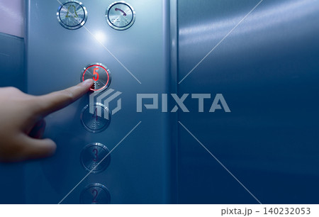 Person pressing on the fifth floor of elevator button. Hand press number 5 on button inside office or hotel lift. Index finger press on lift button. Claustrophobia. People stuck in lift. Braille code. 140232053