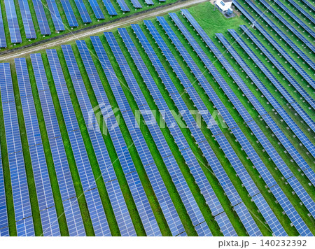 Aerial view of solar farm. Sustainable renewable energy and modern photovoltaic technology for eco-friendly electricity production. Solar power station. Green energy solutions. Solar panel technology. 140232392