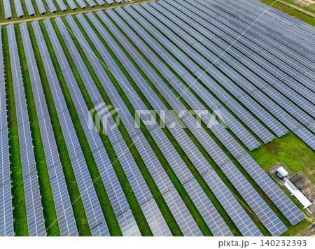 Aerial view of solar farm. Sustainable renewable energy and modern photovoltaic technology for eco-friendly electricity production. Solar power station. Green energy solutions. Solar panel technology. 140232393