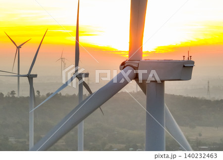 Wind farm field and sunset sky. Wind power. Sustainable, renewable energy. Wind turbines generate electricity. Sustainable development. Green technology for energy sustainability. Eco-friendly energy. Wind farm field and sunset sky. Wind power. Sustainable, renewable energy. Wind turbines generate electricity. Sustainable development. Green technology for energy sustainability. Eco-friendly energy. 140232463