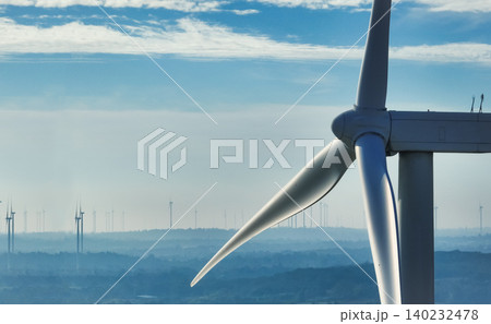 Wind energy. Wind power. Sustainable, renewable energy. Wind turbines generate electricity. Wind farm. Sustainable resources. Sustainable development. Green technology for energy sustainability. 140232478