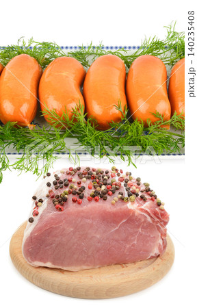 Raw pork meat with peppercorns on cutting board and smoked sausages with fresh dill isolated on white background Raw pork meat with peppercorns on cutting board and smoked sausages with fresh dill isolated on white background 140235408