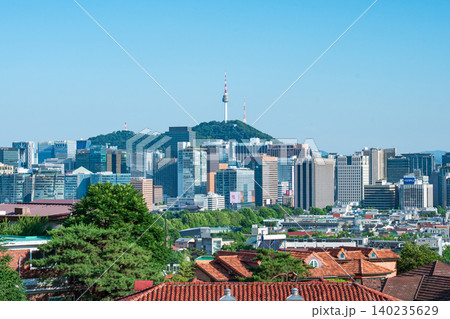 Seoul, South Korea - June. 05, 2026 : Scenic view of Namsan Seoul Tower towering over downtown skyscrapers on a clear summer day in Seoul, South Korea Seoul, South Korea - June. 05, 2026 : Scenic view of Namsan Seoul Tower towering over downtown skyscrapers on a clear summer day in Seoul, South Korea 140235629