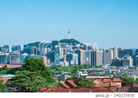 Seoul, South Korea - June. 05, 2026 : Scenic view of Namsan Seoul Tower towering over downtown skyscrapers on a clear summer day in Seoul, South Korea Seoul, South Korea - June. 05, 2026 : Scenic view of Namsan Seoul Tower towering over downtown skyscrapers on a clear summer day in Seoul, South Korea 140235630