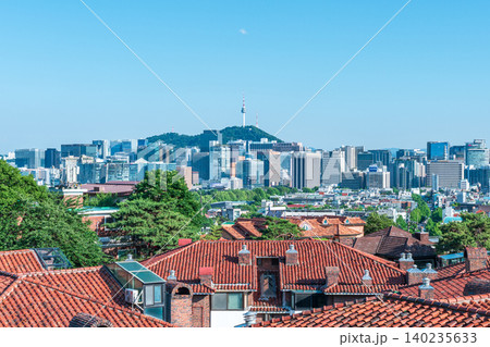 Seoul, South Korea - June. 05, 2026 : Scenic view of Namsan Seoul Tower towering over downtown skyscrapers on a clear summer day in Seoul, South Korea Seoul, South Korea - June. 05, 2026 : Scenic view of Namsan Seoul Tower towering over downtown skyscrapers on a clear summer day in Seoul, South Korea 140235633