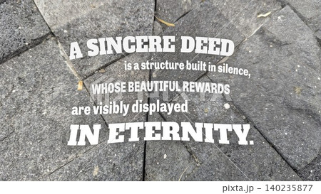 Inspirational horizontal typography layout features motivational quote text, a sincere deed is a structure built in silence whose beautiful rewards are visibly displayed in eternity, over textured Inspirational horizontal typography layout features motivational quote text, a sincere deed is a structure built in silence whose beautiful rewards are visibly displayed in eternity, over textured 140235877