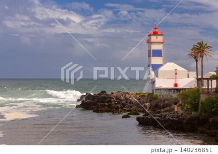 Santa Marta Lighthouse Tower in Cascais Portugal Under Cloudy Sky Santa Marta Lighthouse Tower in Cascais Portugal Under Cloudy Sky 140236851