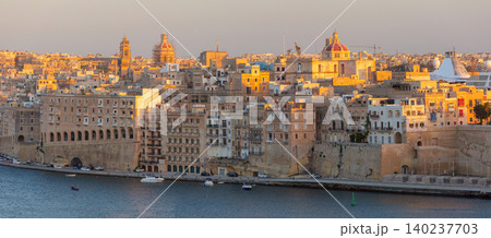 Historic waterfront skyline of Valletta at sunrise in Malta 140237703