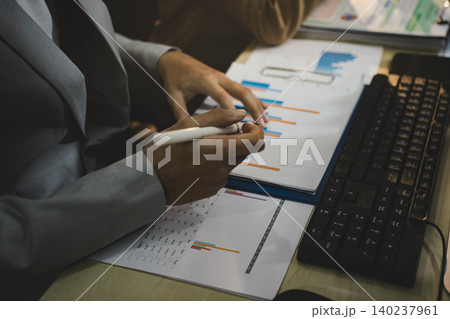 Business accounting concept, Business man using calculator with computer laptop, budget and loan paper in office. 140237961