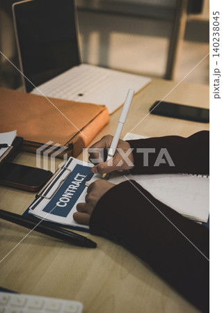 Lawsuit and justice concept, Lawyer working with partner at law firm. legal consulting discussion defendant punishment law in courtroom Lawsuit and justice concept, Lawyer working with partner at law firm. legal consulting discussion defendant punishment law in courtroom 140238045