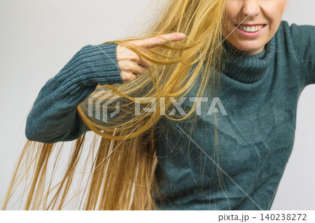 Angry female pointing with finger 140238272