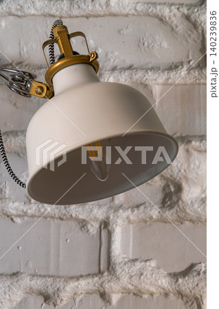 Modern Industrial Wall Lamp on White Painted Brick Wall Modern Industrial Wall Lamp on White Painted Brick Wall 140239836