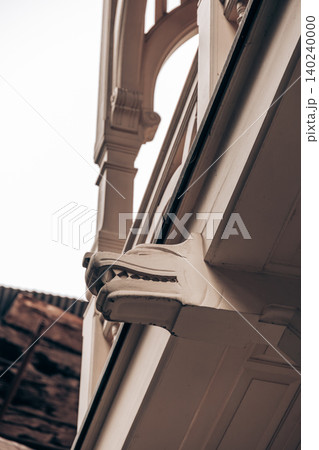 Decorative Dragon Head Wooden Bracket on Historic Building Decorative Dragon Head Wooden Bracket on Historic Building 140240000