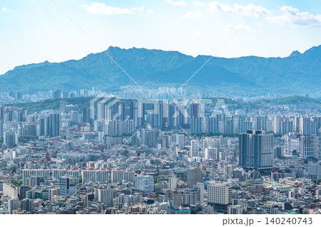 Panoramic view of downtown Seoul city skyline from Yongmasan mountain observatory on a clear spring afternoon Panoramic view of downtown Seoul city skyline from Yongmasan mountain observatory on a clear spring afternoon 140240743