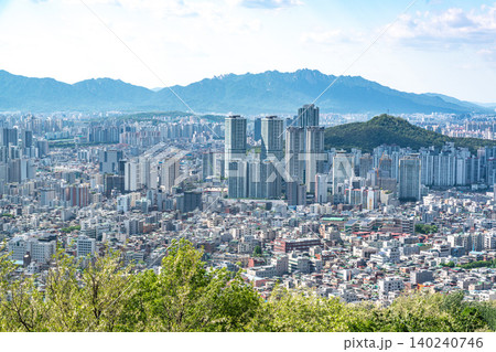 Panoramic view of downtown Seoul city skyline from Yongmasan mountain observatory on a clear spring afternoon Panoramic view of downtown Seoul city skyline from Yongmasan mountain observatory on a clear spring afternoon 140240746