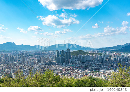Panoramic view of downtown Seoul city skyline from Yongmasan mountain observatory on a clear spring afternoon Panoramic view of downtown Seoul city skyline from Yongmasan mountain observatory on a clear spring afternoon 140240848
