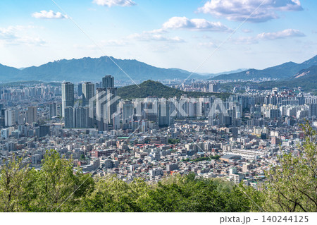 Panoramic view of downtown Seoul city skyline from Yongmasan mountain observatory on a clear spring afternoon 140244125
