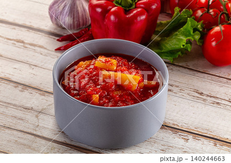 Red Pepper Sauce in Grey Bowl Red Pepper Sauce in Grey Bowl 140244663