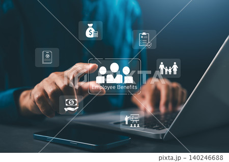 Employee benefits compensation strategy involves healthcare insurance while person using laptop selects virtual icons representing financial perks vacation and workplace incentives 140246688