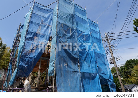 Japanese Construction Scaffolding with Safety Netting Japanese Construction Scaffolding with Safety Netting 140247831