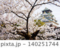 Osaka Castle with cherry blossom 140251744