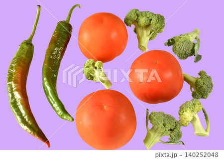 A selection of fresh vegetables, including ripe carrots, cauliflower, red tomatoes and a few hot chili peppers. A selection of fresh vegetables, including ripe carrots, cauliflower, red tomatoes and a few hot chili peppers. 140252048