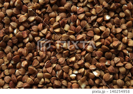 Raw buckwheat grains macro texture top view 140254958