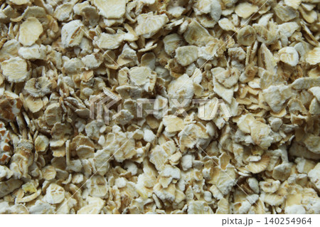 Oatmeal flakes macro texture top view Oatmeal flakes macro texture top view 140254964