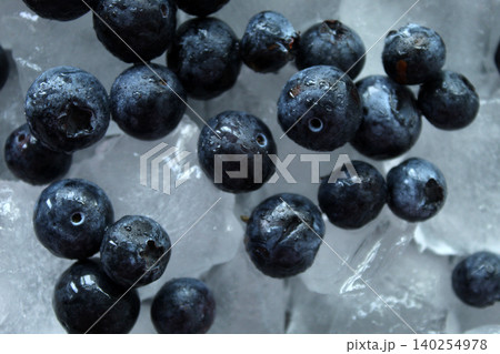 Fresh blueberries on crushed ice macro top view 140254978
