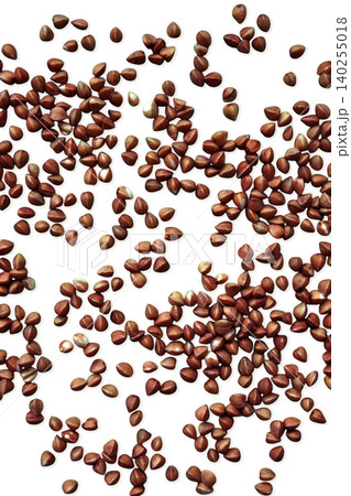Scattered buckwheat grains top view flat lay. Vertical Scattered buckwheat grains top view flat lay. Vertical 140255018