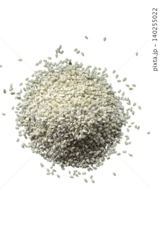 Pile of white sesame seeds top view Pile of white sesame seeds top view 140255022