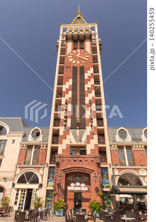 Clock tower of Piazza Square surrounded by historic style architecture in central Batumi, Georgia. 140255459