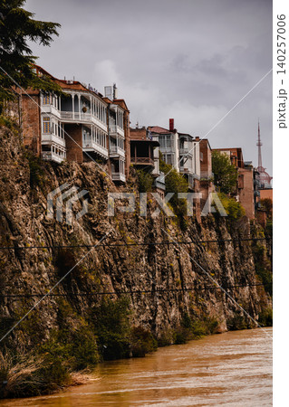 Historic Riverside Houses Perched on Rocky Cliff Above Historic Riverside Houses Perched on Rocky Cliff Above 140257006