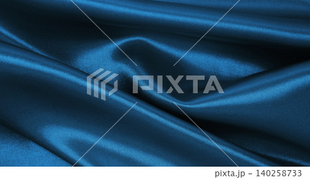 Smooth elegant blue silk or satin luxury texture as abstract background. Luxurious Christmas background or New Year background design Smooth elegant blue silk or satin luxury texture as abstract background. Luxurious Christmas background or New Year background design 140258733