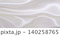 Smooth elegant white silk or satin luxury cloth texture as wedding background. Luxurious background design 140258765