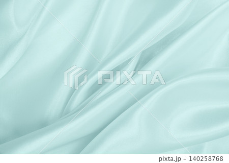 Smooth elegant blue silk or satin luxury cloth texture as abstract background. Luxurious background design 140258768