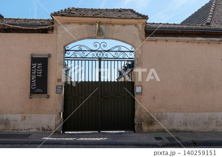 Champagne Fedyk estate entrance with stone arch and iron gate in Hautvillers France 140259151