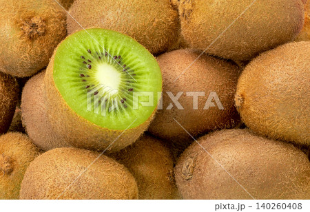 Close-up of many juicy kiwi fruits. Kiwi Fruit - background. Close-up of many juicy kiwi fruits. Kiwi Fruit - background. 140260408