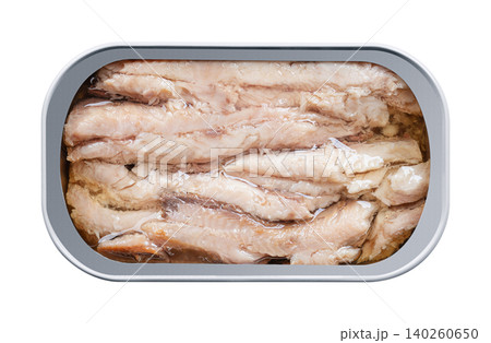 Sardine fillets, skinless and boneless, in sunflower oil, in an open tin can. Wild-caught sardines, also called pilchards, rich in protein, omega-3, calcium, and vitamins. Isolated, from above. Photo Sardine fillets, skinless and boneless, in sunflower oil, in an open tin can. Wild-caught sardines, also called pilchards, rich in protein, omega-3, calcium, and vitamins. Isolated, from above. Photo 140260650