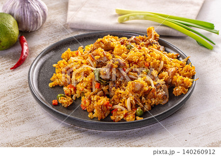 Fried rice with chicken and vegetables on plate Fried rice with chicken and vegetables on plate 140260912